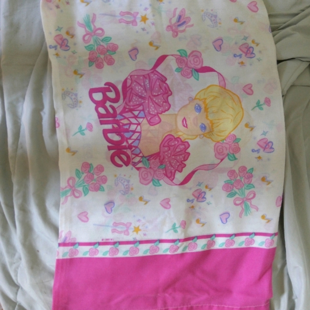 Barbie pillowcases (2). $16 for both.